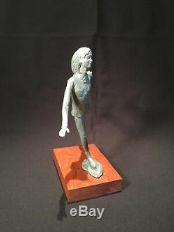 Bronze sculpture by NANCY DUPONT TWYMAN titled Poetry On Ice female ice skater