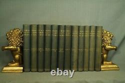 The Works of George Eliot antique old books 12 volume set faded decorators shelf