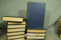The Works of George Eliot antique old books 12 volume set faded decorators shelf